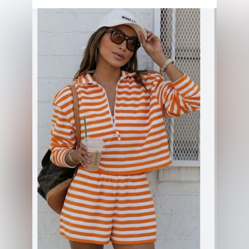 Bandier x Sincerely Jules orange and white terry set